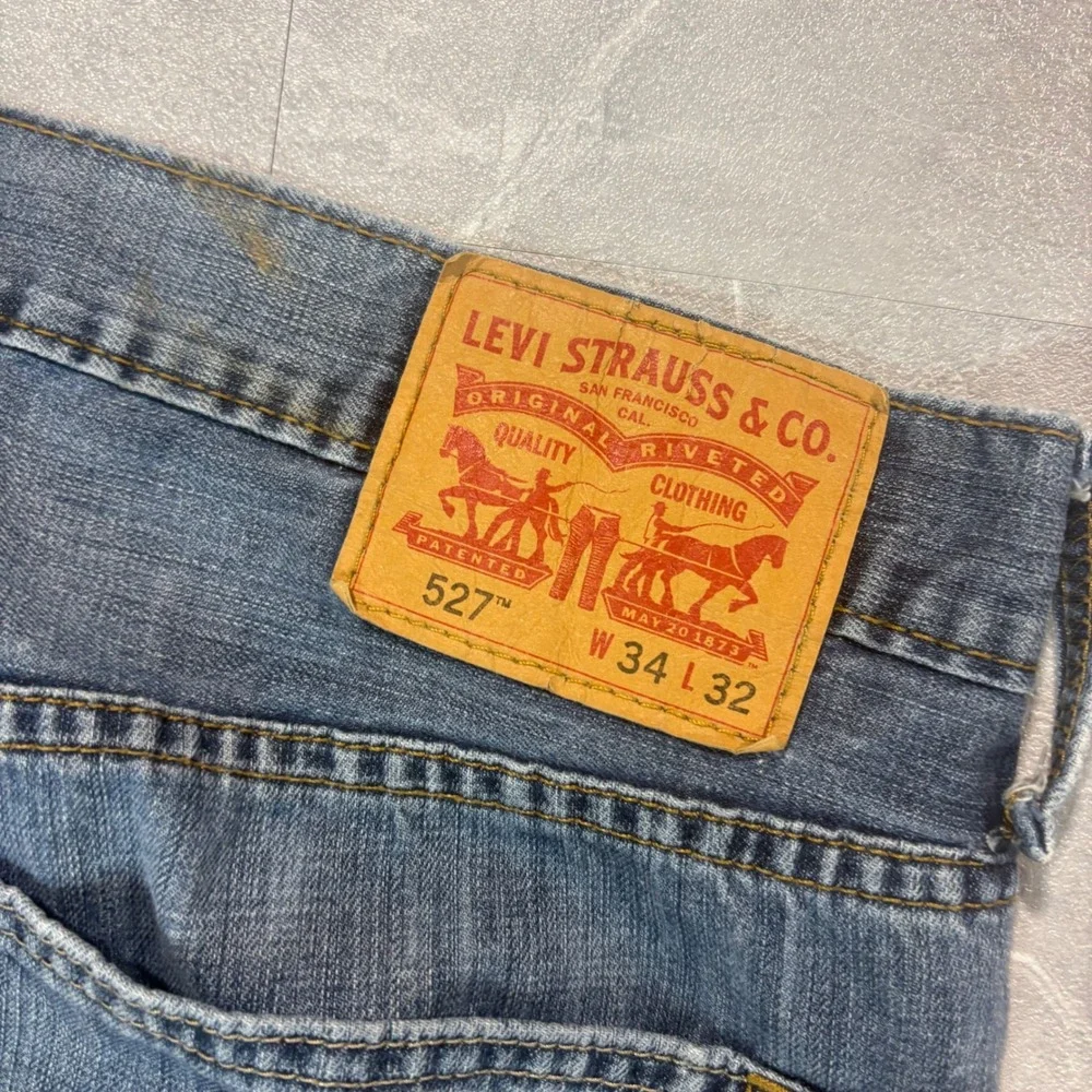 Levis 527 Slim Bootcut Jeans Mens 34x32 Blue Denim Frayed Hem 527-0475